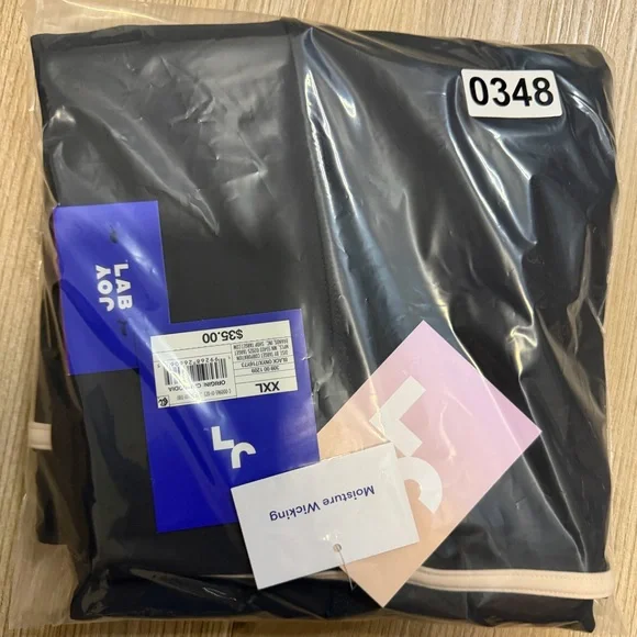 JoyLab™ Women's High-Rise Contrast Piped 7/8 Leggings - Black/Tan XS & XXL - Picture 10 of 12